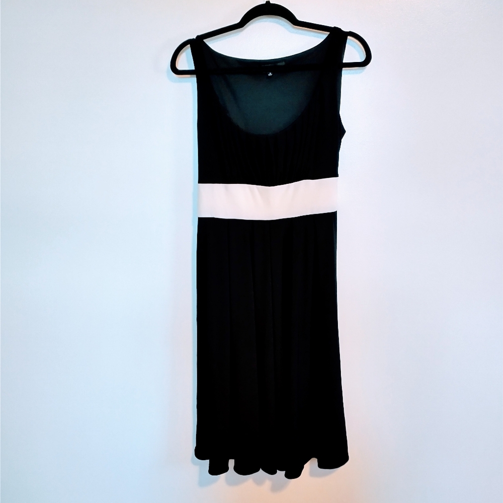 Nine West black babydoll style dress with white tie detail at waist that can tie